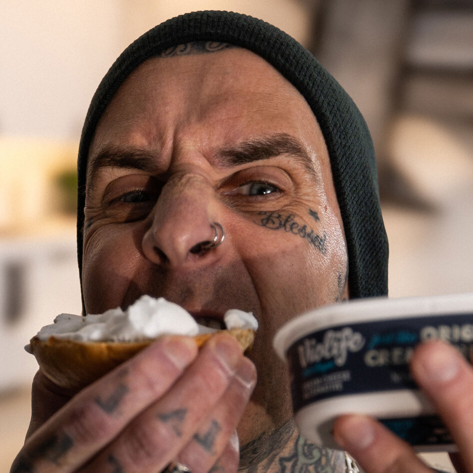 Why Travis Barker Wants to Buy You a Cheesy Bagel on New Year's Day