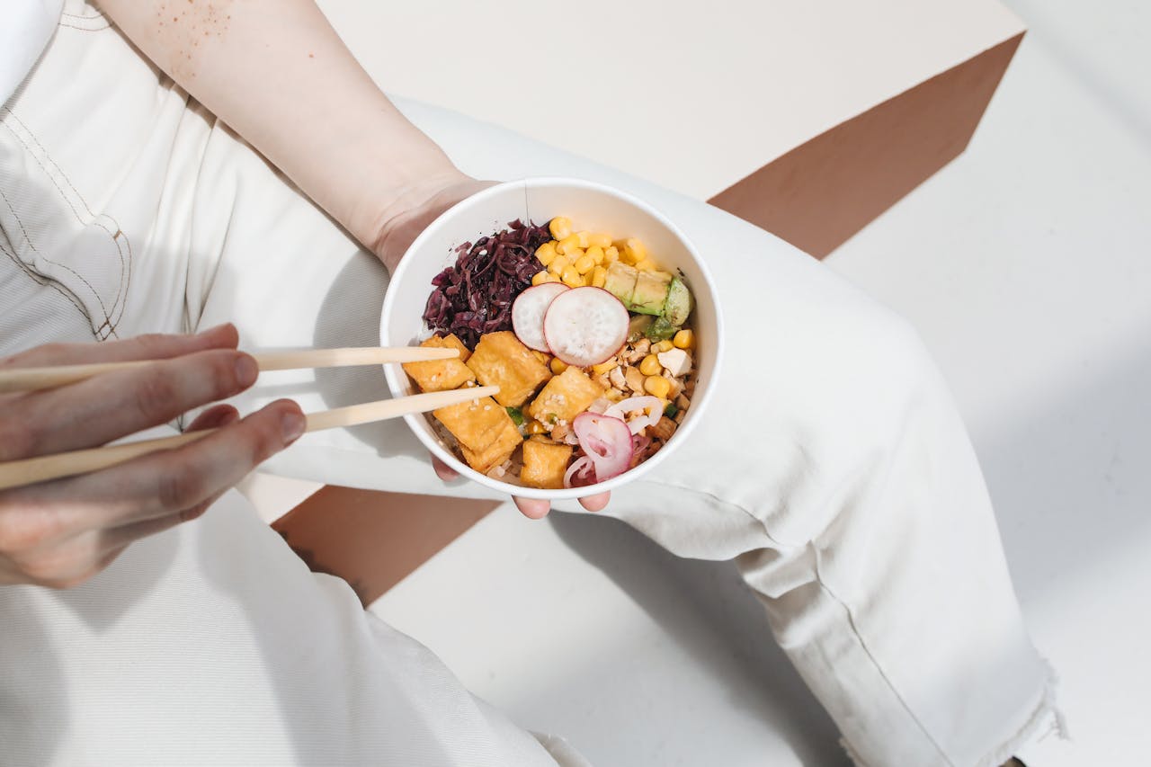 eating tofu bowl
