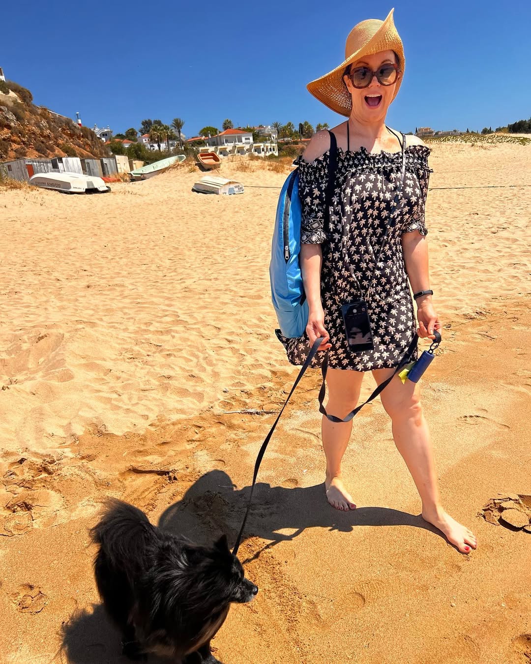 Bellamy Young and dog on beach