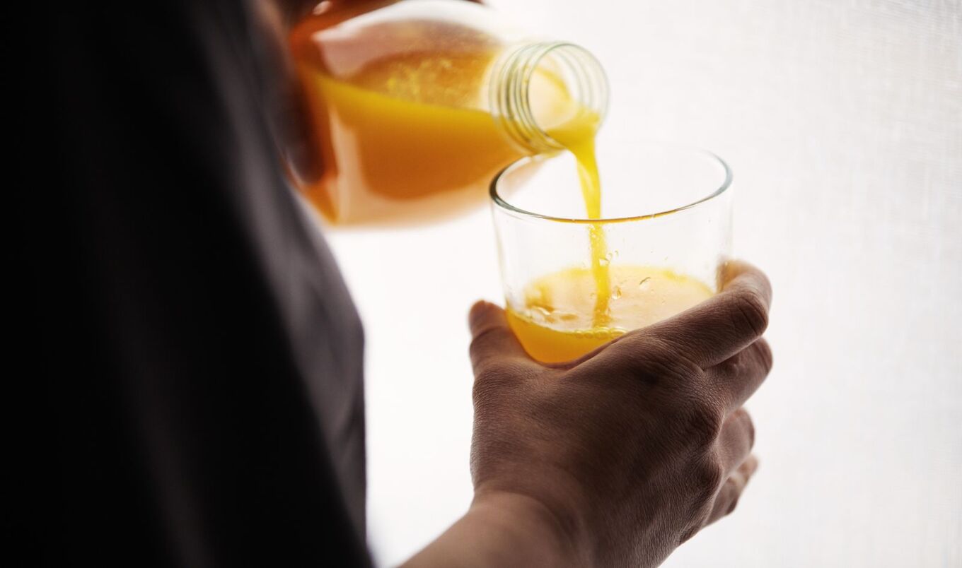 pouring orange juice