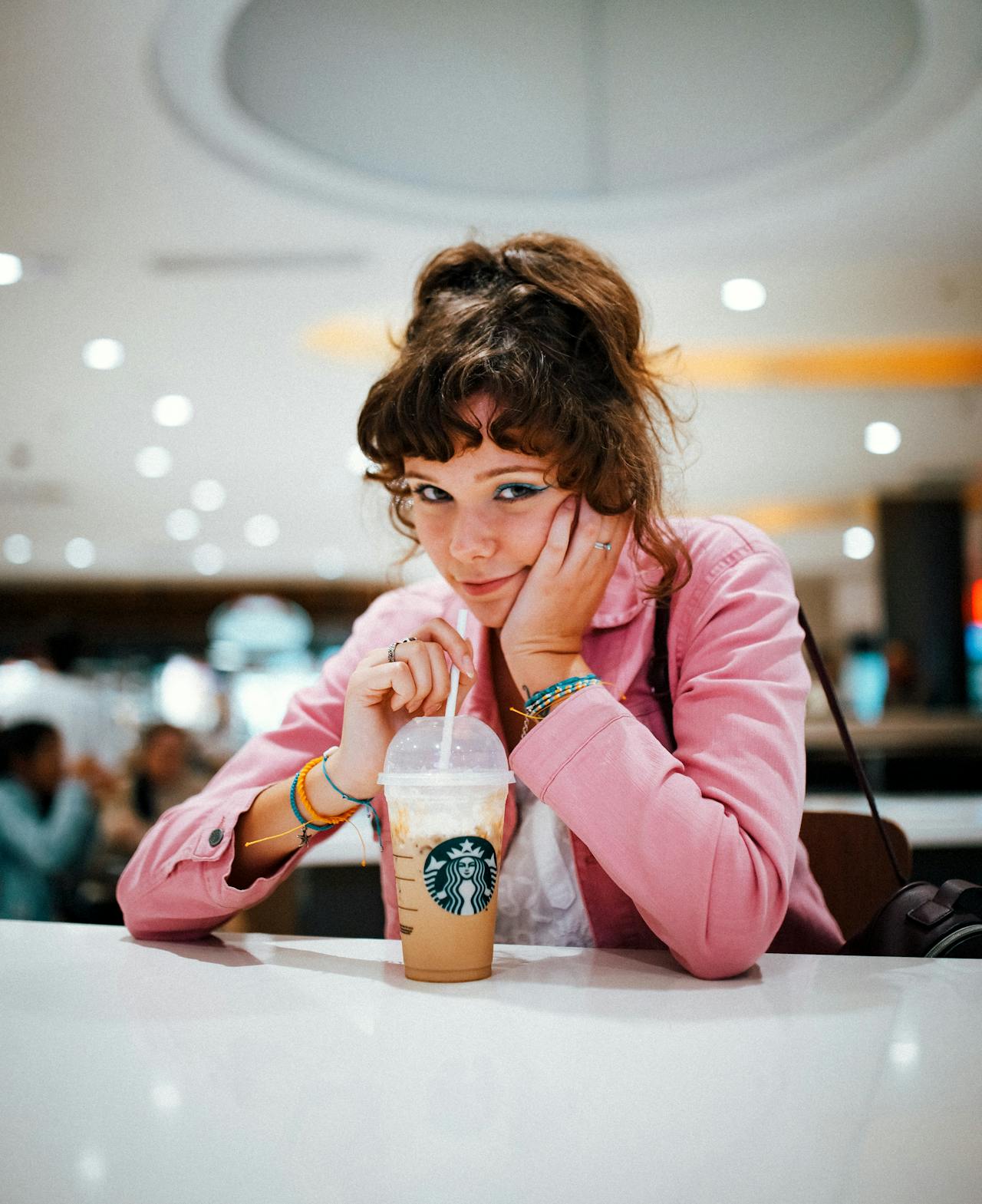 Woman with starbucks