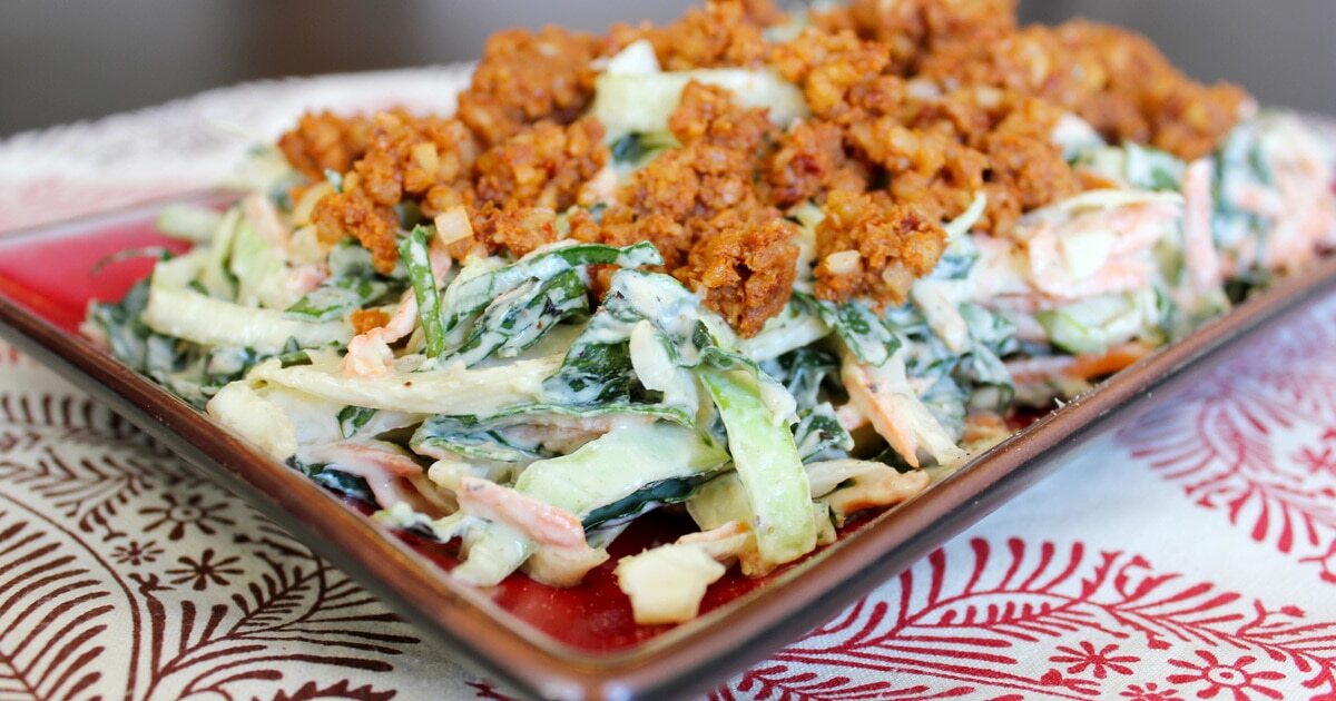 Kale Slaw With Barbecue Walnut Crumble | VegNews