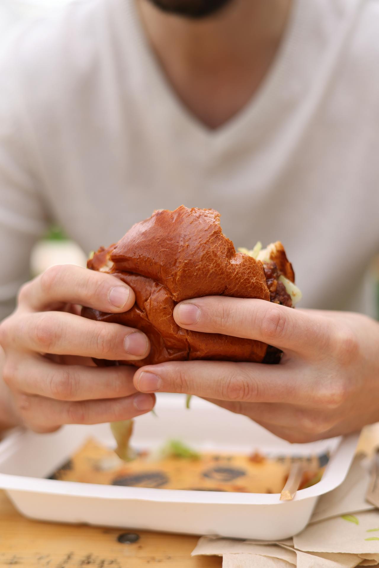 person eating burger