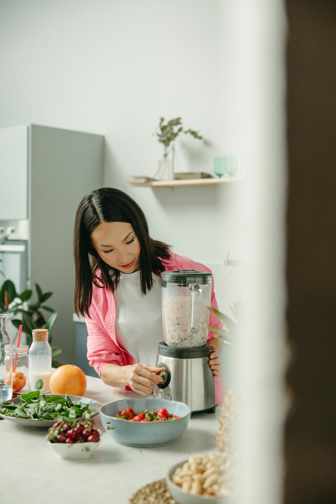 woman using blender