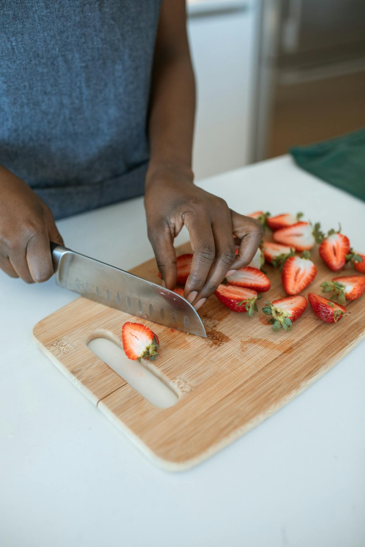 chopping strawberries