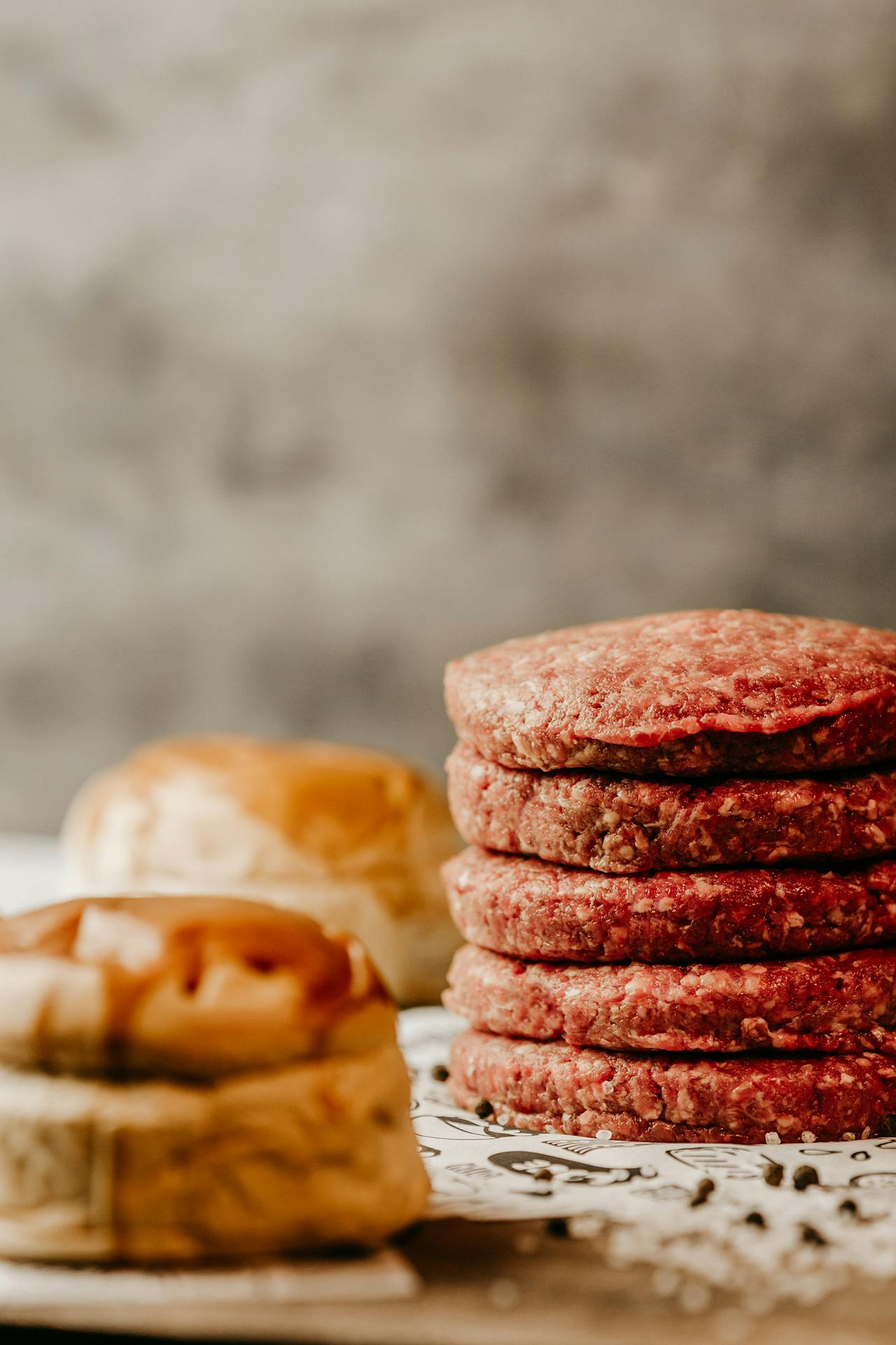 stack of raw hamburgers