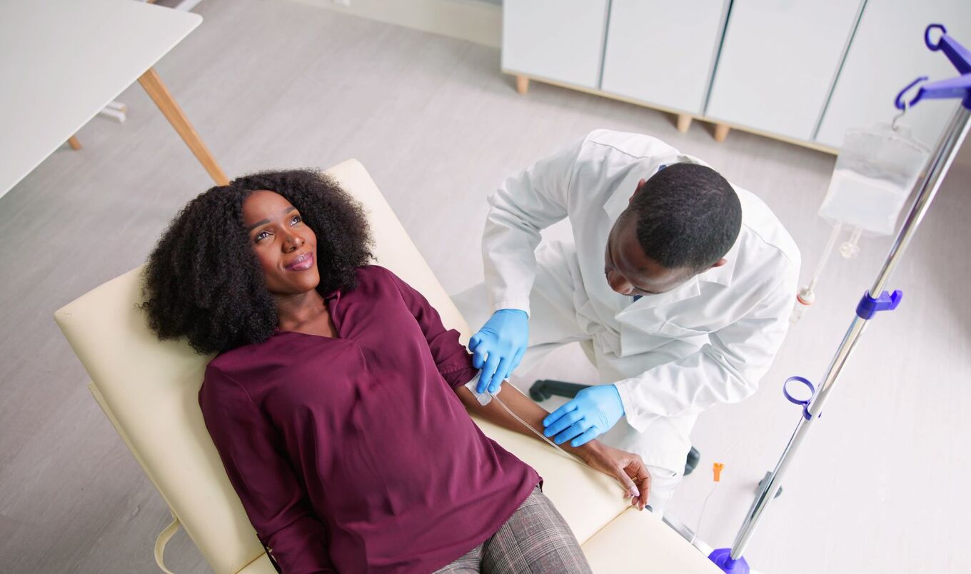 woman getting vitamin IV