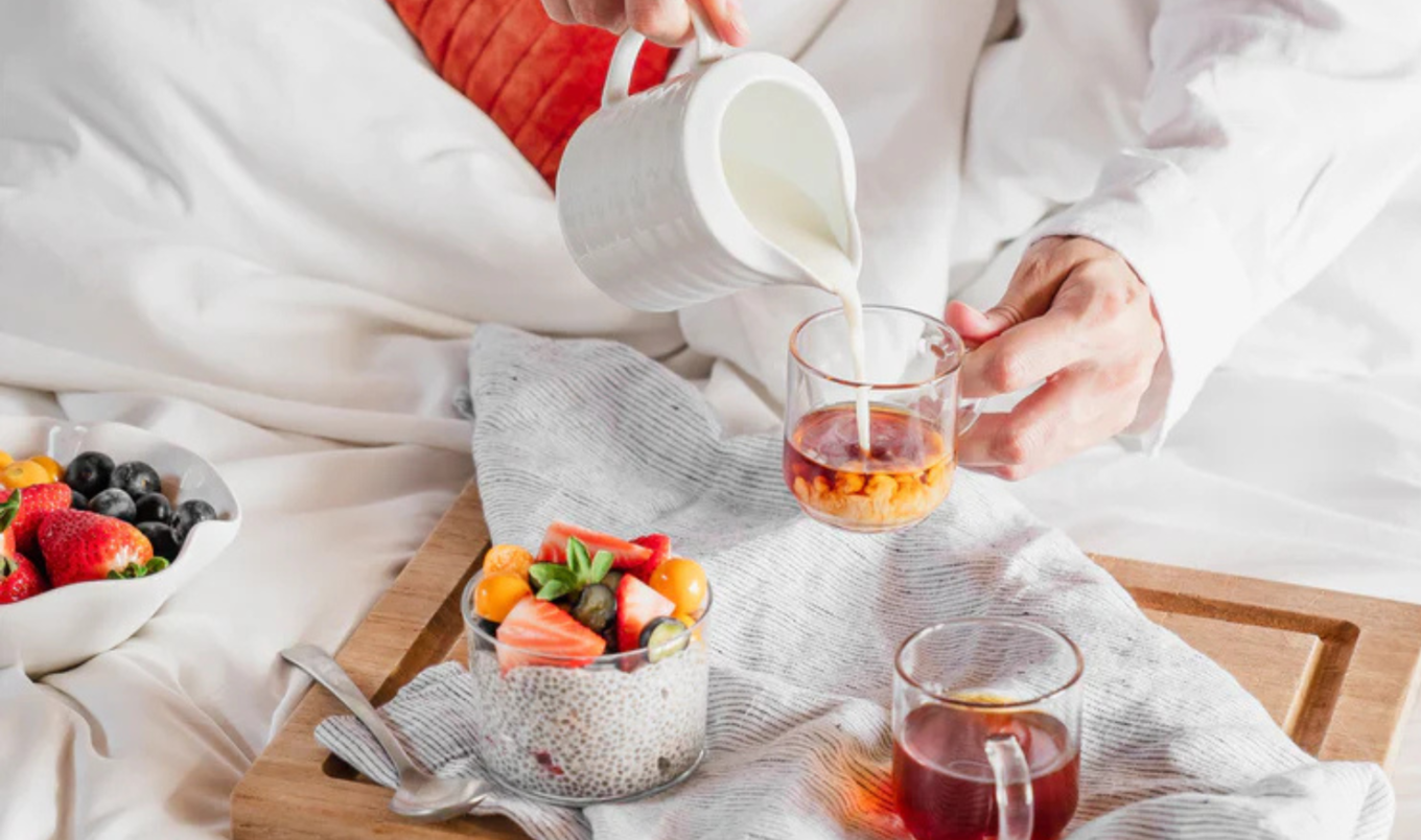 Pouring milk into coffee