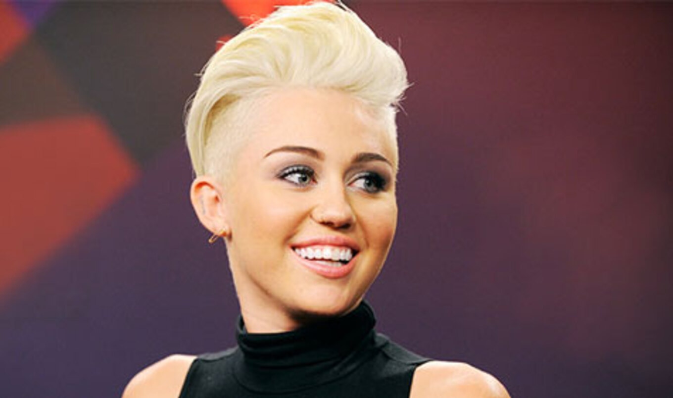 Pamela Anderson Joins Fellow Vegan Miley Cyrus on Stage
