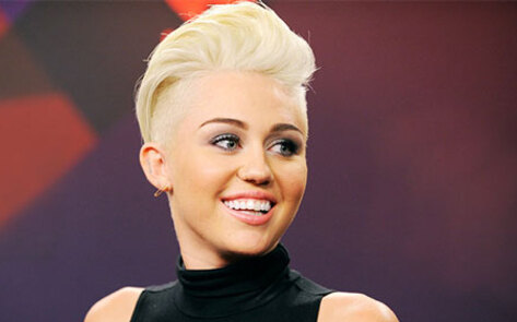 Pamela Anderson Joins Fellow Vegan Miley Cyrus on Stage