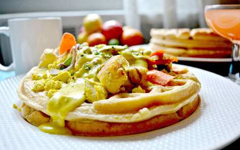 Vegan Savory Waffle with Vegetable Ragout and Cheddar Fondue